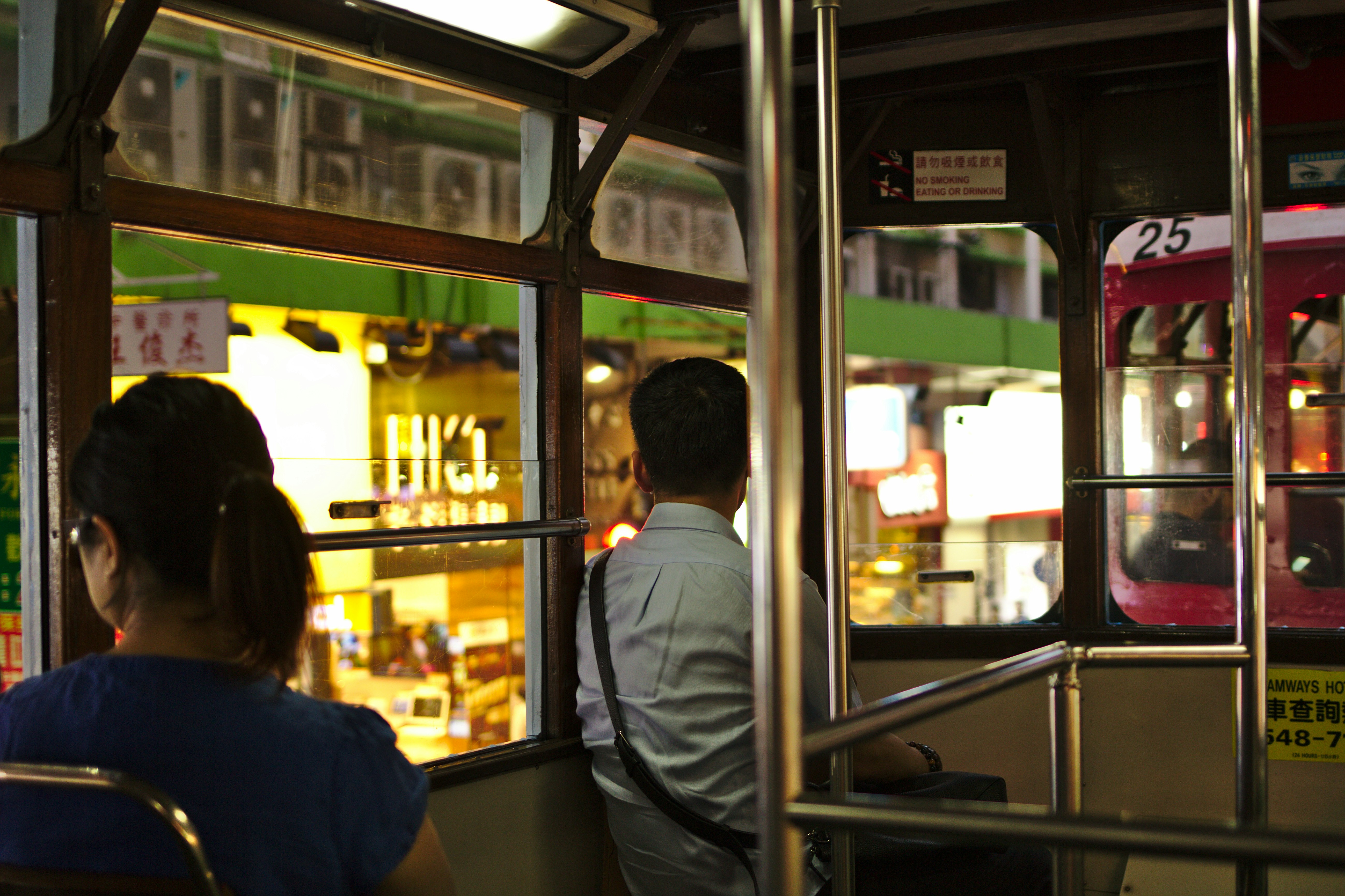 man and woman on bus